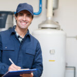 Technician servicing an hot-water heater